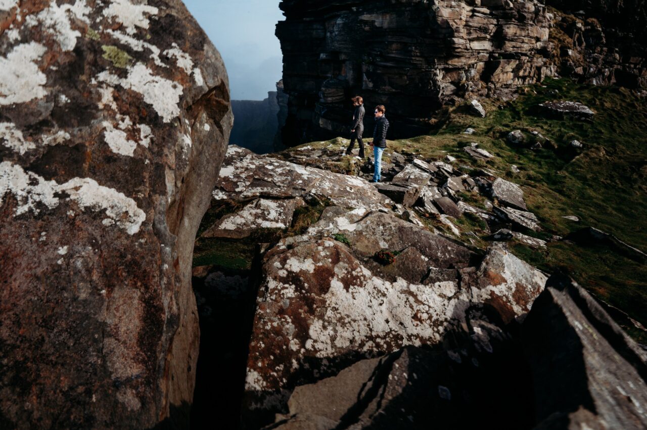 A couple explore the Irish landscape on their vacation in Ireland